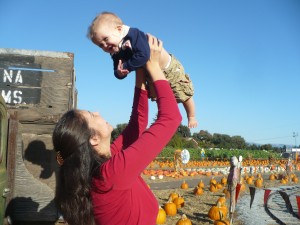 Baby at a pumpkin patch