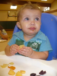 baby eating chips