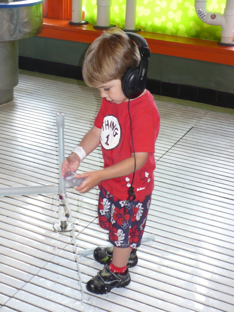 child with autism wearing headphones